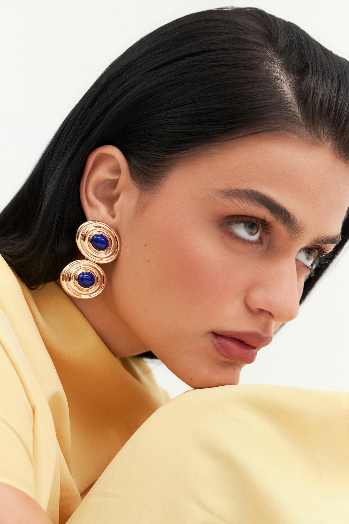 Model wearing Bossa 2-in-1 earrings by Balbino 
